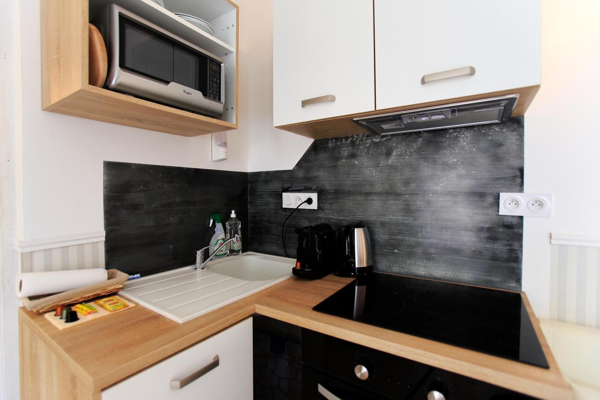 Hotel Saint Georges Τρουά Δωμάτιο φωτογραφία A typical kitchenette